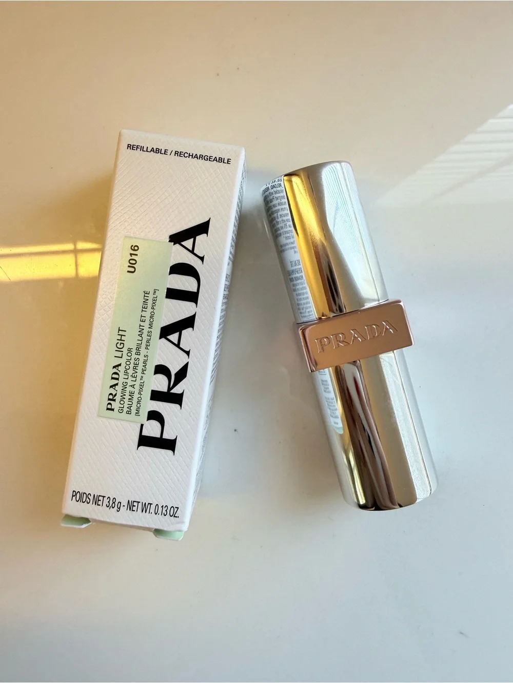 Prada Light Refillable Glowing Lip Oil Stick in Rose U016 Bubblegum Pink